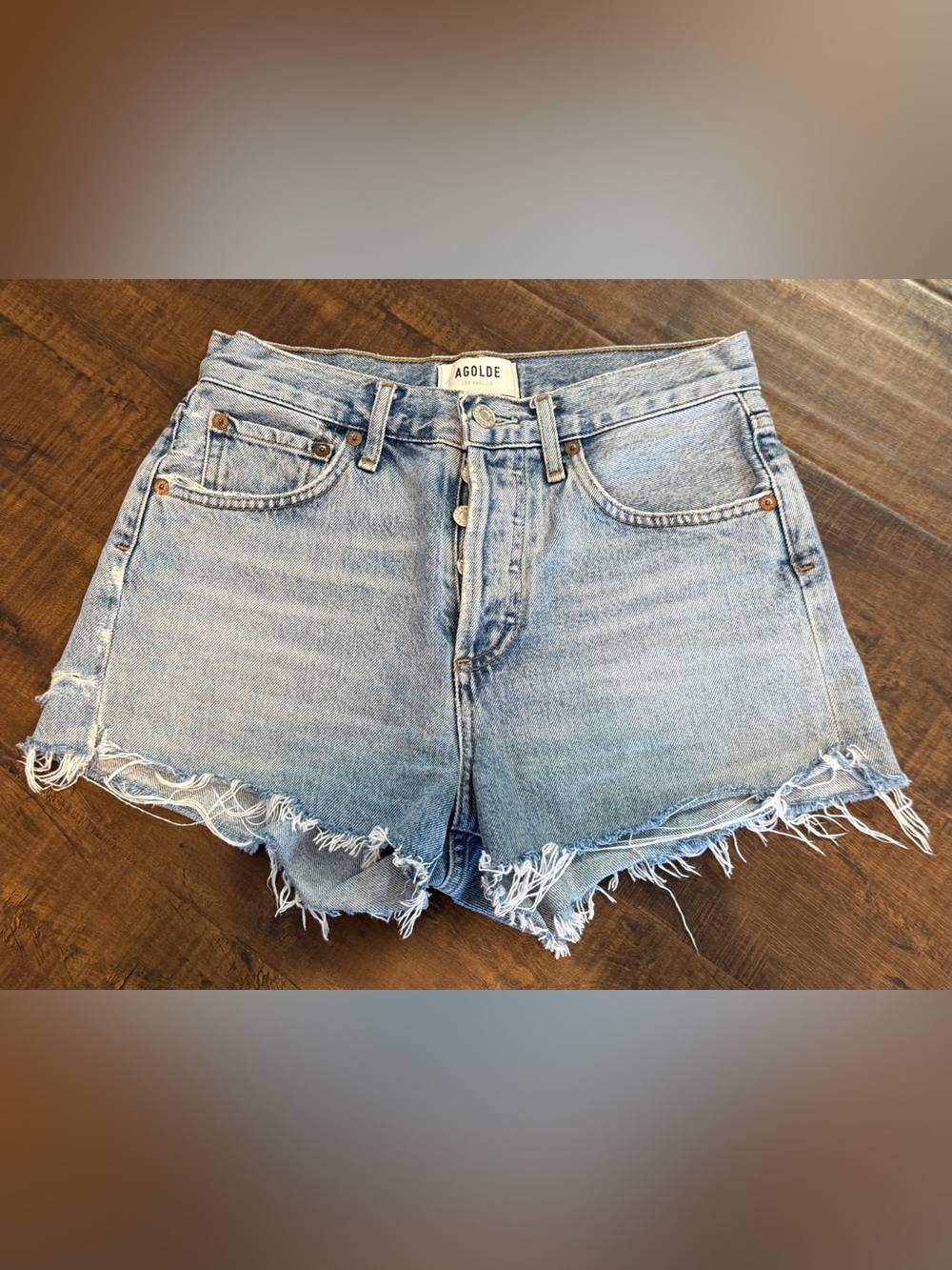 Agolde Light Blue Frayed Denim Cutoff Shorts